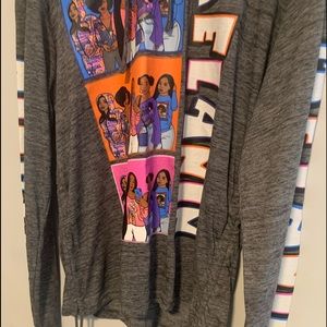 Melanin long sleeve shirt with a hoodie.